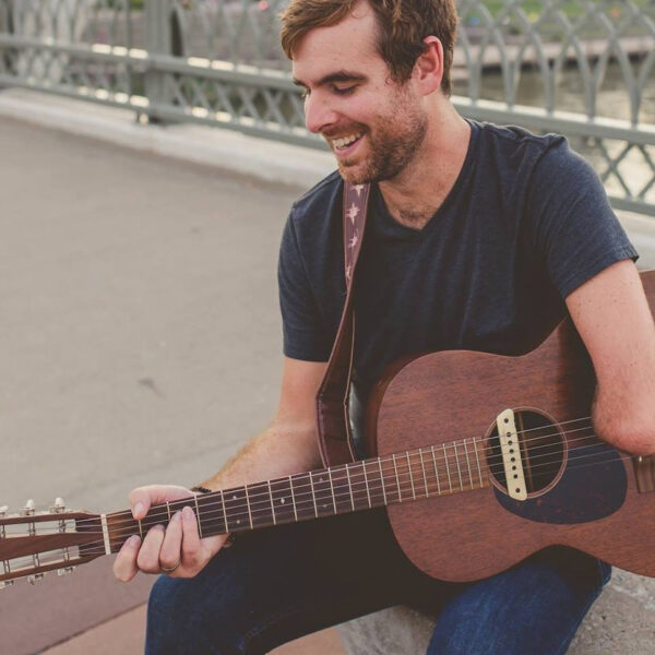 Tony Memmel playing guitar